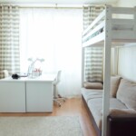 Meble do salonu z sypialnią. Jak ukryć łóżko w salonie?